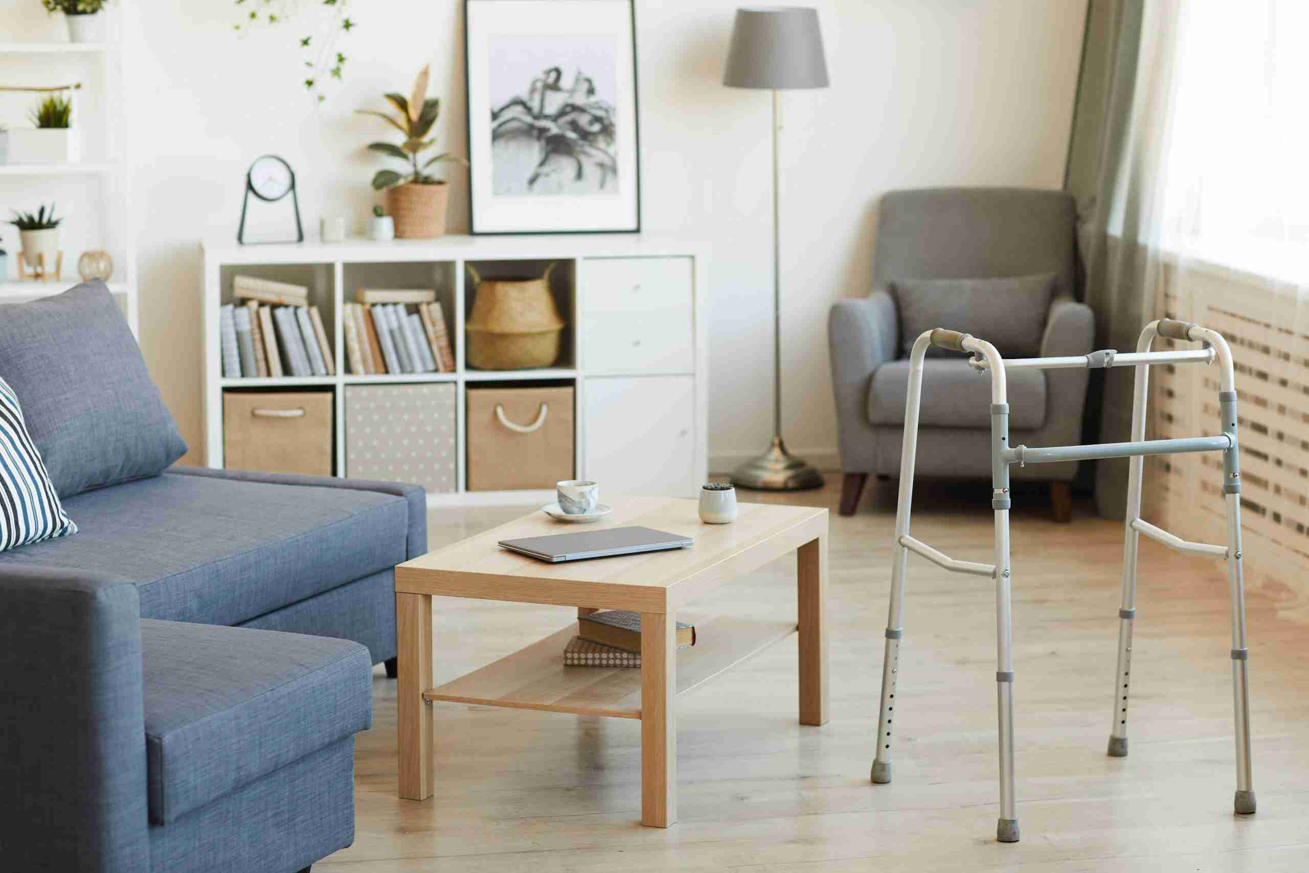 empty living room with a walker