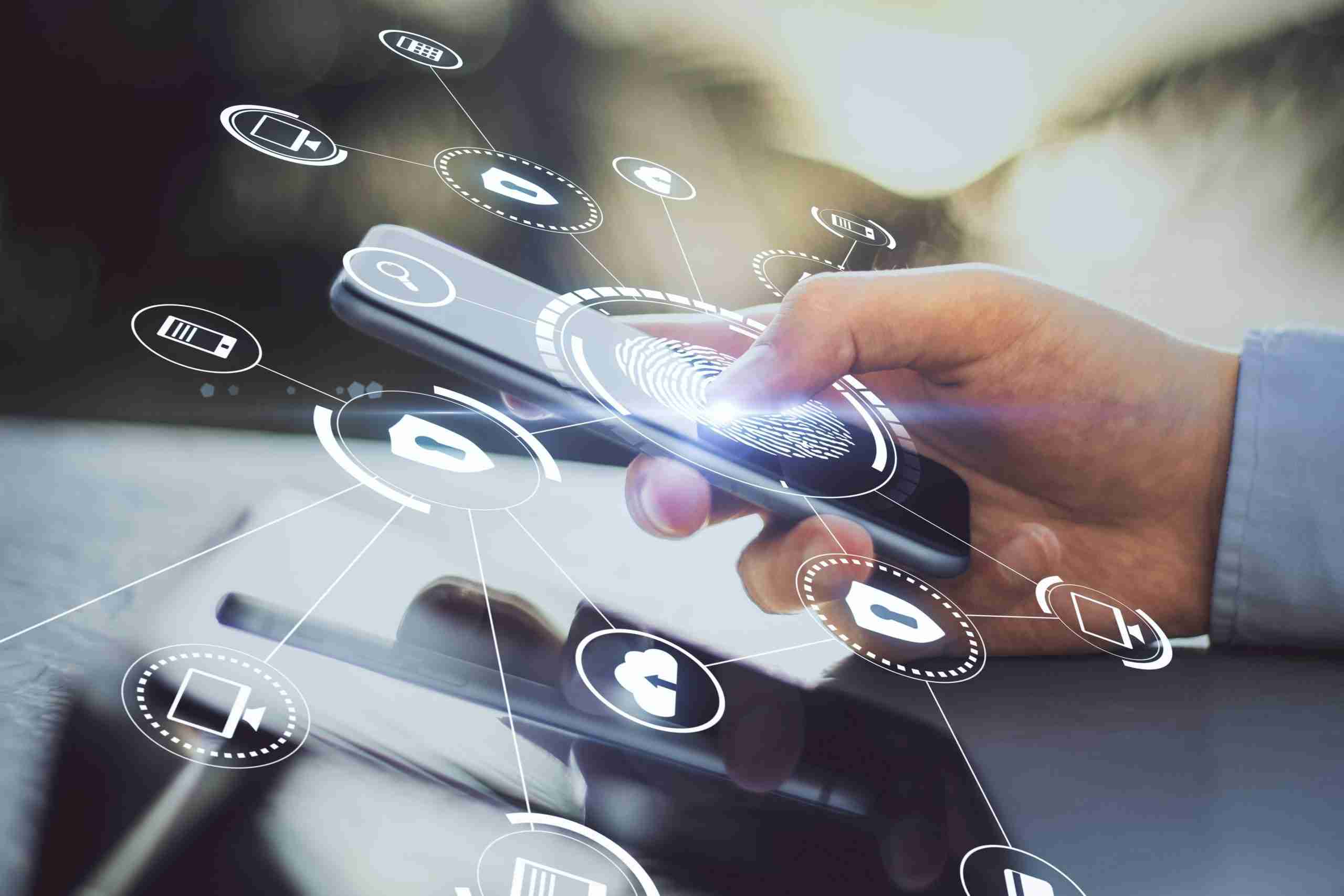 person holding a cell phone with floating icons to represent integrated security systems