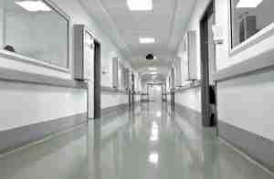 empty hospital corridor with secure doors