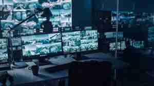 comprehensive video surveillance concept - computer screens showing cctvs views from multiple security cameras